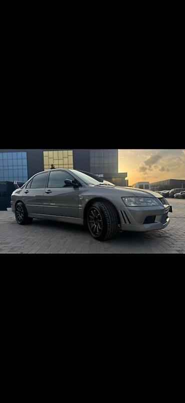 мицу биси: Mitsubishi Lancer Evolution: 2003 г., 2 л, Автомат, Бензин, Седан — 8