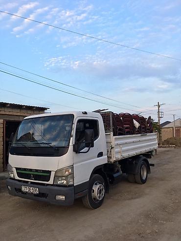 mitsubishi io: Mitsubishi Fuso yüngül tonnajlı yük maşını – daşınma və logistika — 1