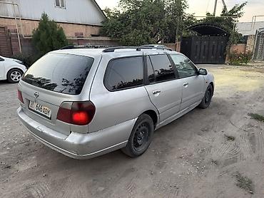 Транспорт: Nissan Primera: 2001 г., 1.8 л, Механика, Бензин, Универсал — 4