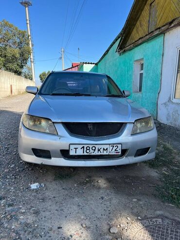 Mazda: Mazda Familia: 2002 г., 1.5 л, Автомат, Газ, Седан