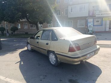 победа машина: Daewoo Nexia, седан, золотистый цвет. Основные характеристики: -