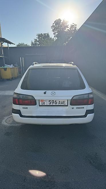 мото зонтик: Mazda Capella: 1999 г., Универсал — 4