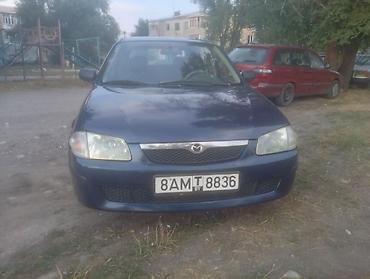 губа 211: Mazda 323: 2000 г., Механика, Бензин — 1