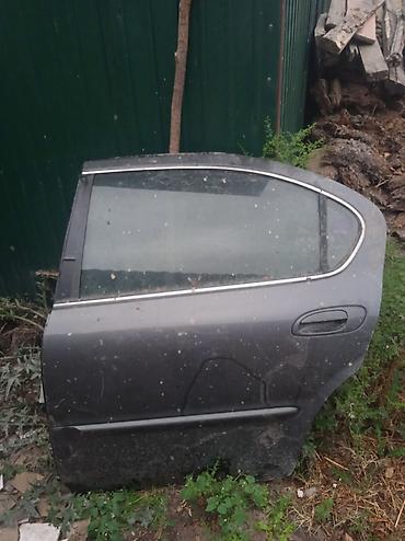 maxima j30: Задняя левая дверь в сборе для Nissan Maxima (A33), модельный год — 1