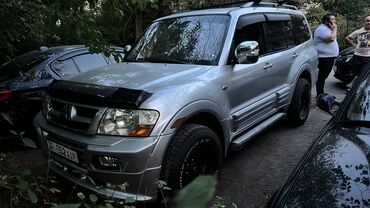 купить запчасти на опель вектра б: Серебристый внедорожник Mitsubishi Montero 2001 года. Автомобиль