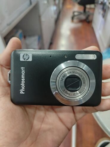 ekran boyuducu: HP Photosmart rəqəmsal fotoaparat - Kompakt korpus, qara rəng. -