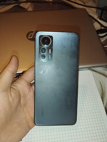 iphone 11 yaddas: Xiaomi 12, rəng - Qara — 8