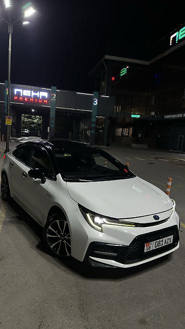 покрышки на 12: Toyota Corolla: 2022 г., 1.8 л, Гибрид, Седан — 1