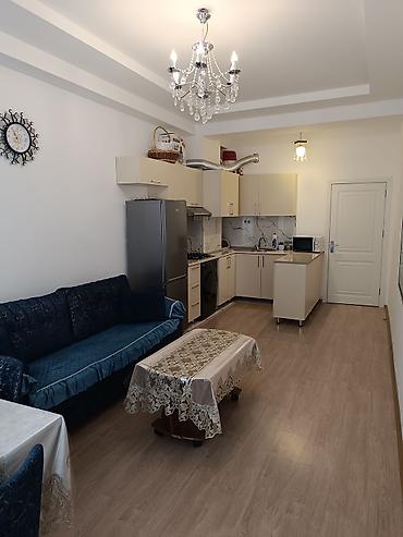 kupca: 2 otaqlı, Yeni tikili, 69 kv. m — 4