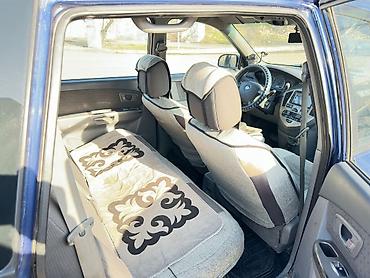 Kia: Kia Carens: 2005 г., Минивэн — 10