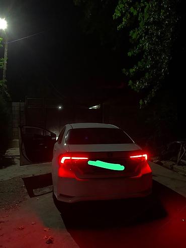 карол: Toyota Corolla: 2019 г., Вариатор, Гибрид, Седан — 3
