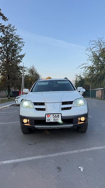 lancer 9: Mitsubishi Outlander: 2004 г., 2.4 л, Автомат, Газ, Кроссовер — 5