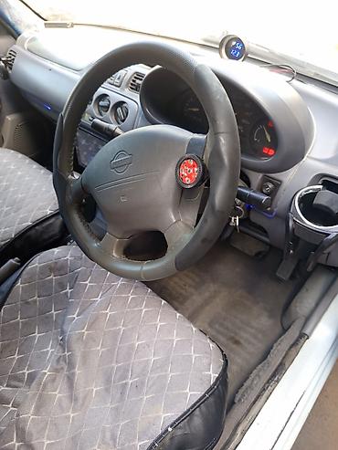 mazda premacy 2002: Nissan March: 2000 г., 0.1 л, Автомат, Бензин, Хэтчбэк — 9