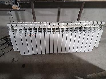Qızdırıcı və isidicilər: 57 seksiya kombi radiatorları satılır. 1 i 17 seksiyalı .1 i 18 — 6