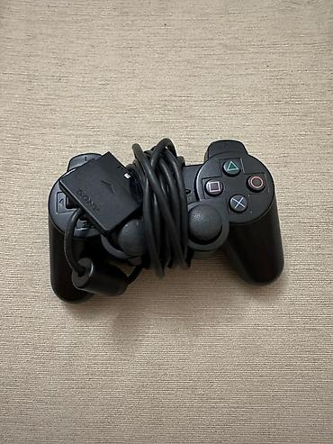 ps2 diskləri: PlayStation 2 Slim oyun konsolu. Kompakt və nazik korpusa malik PS2 — 9