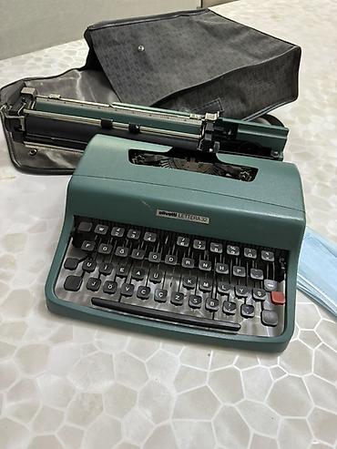 печатный: Портативная печатная машинка Olivetti Lettera 32 - Классическая — 3
