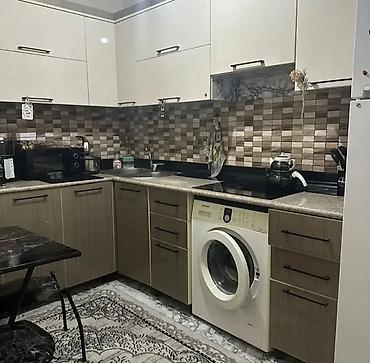 Mənzillər: 2 otaqlı mənzil – mətbəx, qonaq otağı, sanitar qovşaq və dəhliz - — 4