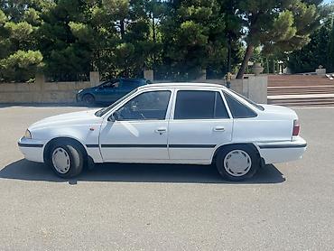 opel astra g opc: Ağ rəngli sedan, 4 qapılı, ön ötürücülü. Klassik, sadə dizaynlı kuzov — 9