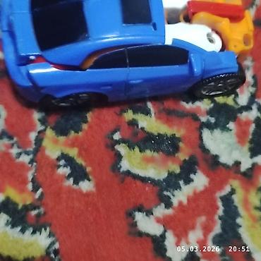 Игрушки: Игрушка-трансформер, способная менять форму из автомобиля в робота — 8