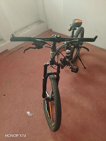 20 dyumlu velosiped: Dağ velosipedi – 26” təkər, üçbıçaqlı magneziya tipli disk diskləri — 4