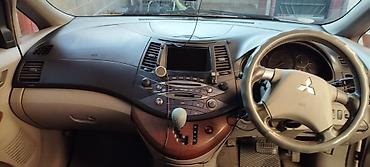митсубиси семиместный: Mitsubishi Grandis: 2004 г., 2.4 л, Автомат, Бензин, Минивэн — 8