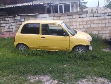 дайхатсу move: Daihatsu Cuore: 2002 г., 1 л, Механика, Бензин, Купе