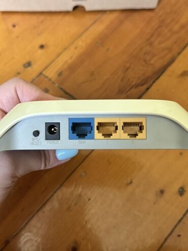 Bıçaqlar: TP-Link 150Mbps Simsiz N Router TL-WR720N modeli, etibarlı simsiz