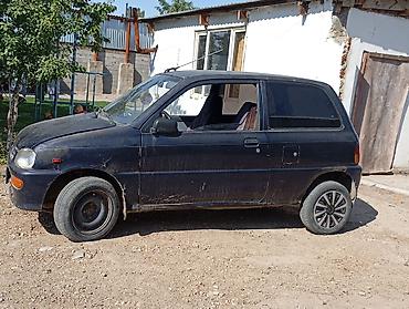 водный мото: Daihatsu Cuore: 1999 г., 0.8 л, Механика, Бензин, Хэтчбэк — 5