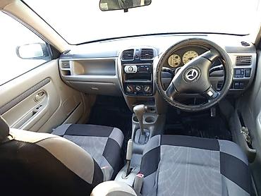 Mazda: Mazda Demio: 2001 г., 1.5 л, Автомат, Бензин, Седан — 5