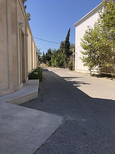 şeki: Torpaq sahəsi – şəhərətrafı məhəllədə, hasarlı həyət və darvazalı — 2