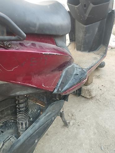 elektrikli moped icaresi: Moped qeza olunub qabag plasmaslari ezilib yanlari cizilib ama tok — 4