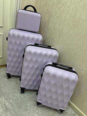 Çamadanlar: 4-lü sərt korpuslu çamadan dəsti - Rənglər: bənövşəyi (lavanda) və — 1
