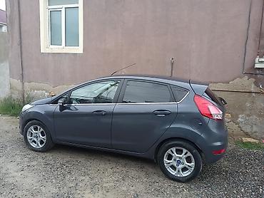 tap.az lada: Ford Fiesta hatchback — tünd boz rəng, 5 qapı. Xüsusiyyətlər: - — 3