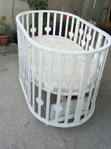 Ağ rəngli beşik – oval formalı, yığma konstruksiya. - Material: ağac lalafo.az -da Ağ rəngli beşik – oval formalı, yığma konstruksiya. - Material: ağac