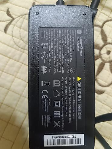 skuter xiaomi: Məhsul: Xiaomi elektrik skuterinin şarj cihazı (Battery Charger / AC — 1