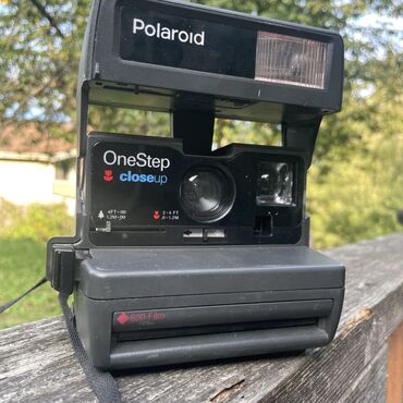 телефон fly nimbus 1: Salam,Bu Poloroid ozu cekib cixaran fotokamera,bilenler bilir