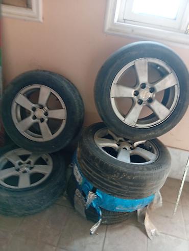 təkər az: Chevrolet orijinal yüngül lehimli disklər və təkər dəsti - Komplekt — 2