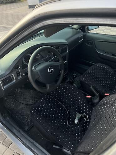 Daewoo: Daewoo Nexia: 2012 г., 1.5 л, Механика, Бензин, Седан — 13