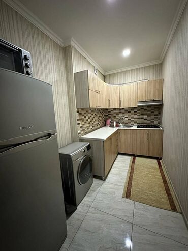 Uzunmüddətli kirayə mənzillər: Əhmədli metrosunun düz çıxışında yeni 19 mərtəbəli binanın 16-cı — 7