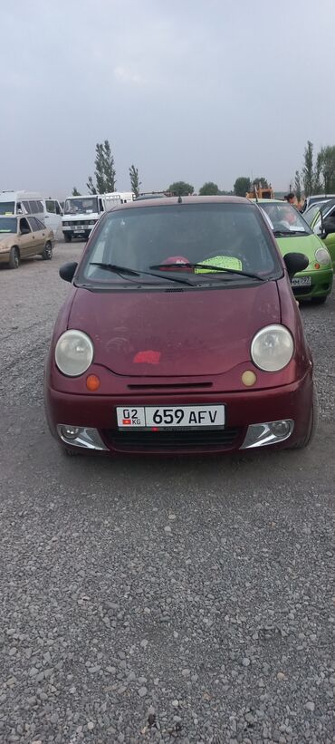 матиз коврик: Автомобиль Daewoo Matiz бордового цвета, компактный хэтчбек с пятью