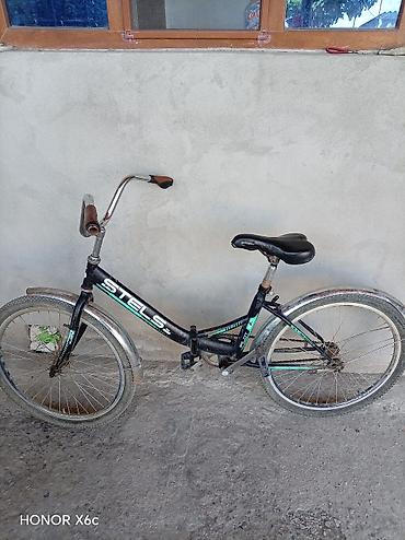 velosipedlər isma: STELS Pilot 24 şəhər/komfort tipli velosiped.Nasosda üstündə verilir — 1