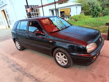 Volkswagen: Dördqapılı qara rəngli hetçbek model "Volkswagen Golf III" avtomobili — 8