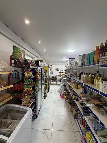 аренда продуктовый: Ж/м Кок Жар Сдается продуктовый магазин с товарами Площадь: 20м2 — 4