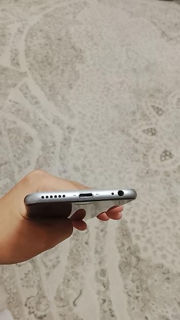 lg g6: Apple iPhone 6 в цвете Space Gray. На корпусе указана модель A1549 — 3