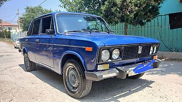 vaz 2106 şit: VAZ 2106 sedan, mavi rəng. Xüsusiyyətlər: - Korpus: 4 qapılı sedan — 4