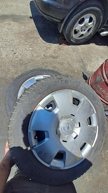opel kolpak: 4 ədəd avtomobil təkəri və 1 ədəd Opel loqolu təkər qalpağı (kolpak) — 5