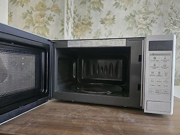 işlenmiş pitminutka: Mikrodalğalı soba LG, Ayrıca dayanan, Mikrodalğalar ilə, rəng - Gümüşü, İşlənmiş — 2