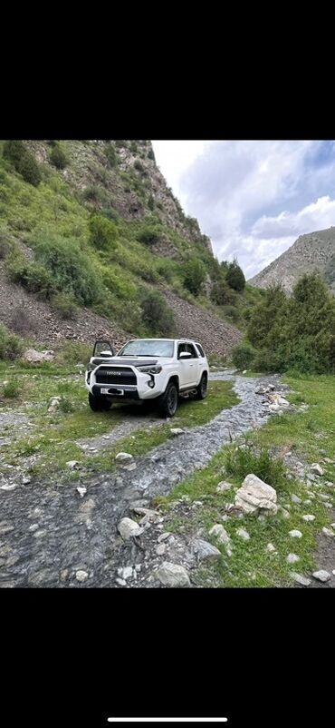 таета фуранер: Toyota 4Runner, белый внедорожник с пакетом трд про Ключевые