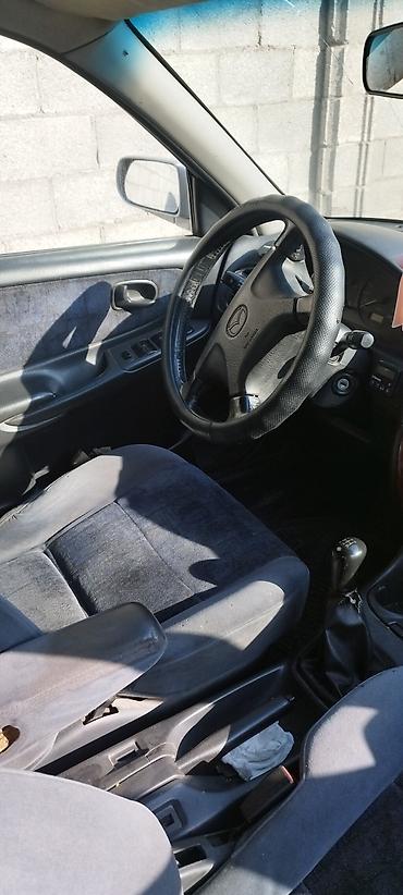 passat variant: Mazda 626: 1999 г., 2 л, Механика, Бензин, Универсал — 3