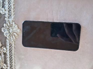 islenmis televizorlar ucuz: IPhone 12, Qara, Simsiz şarj — 4